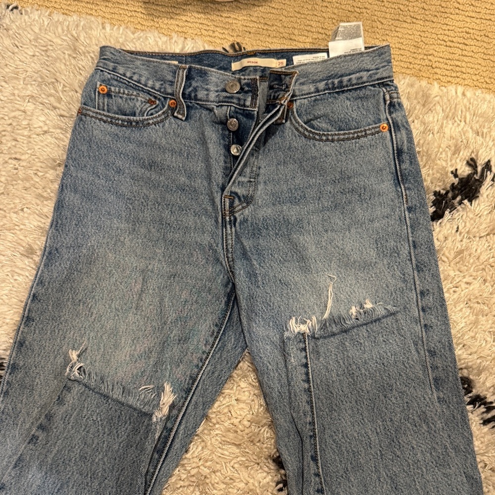 Levi's Women's Straight Jeans in Distressed Blue